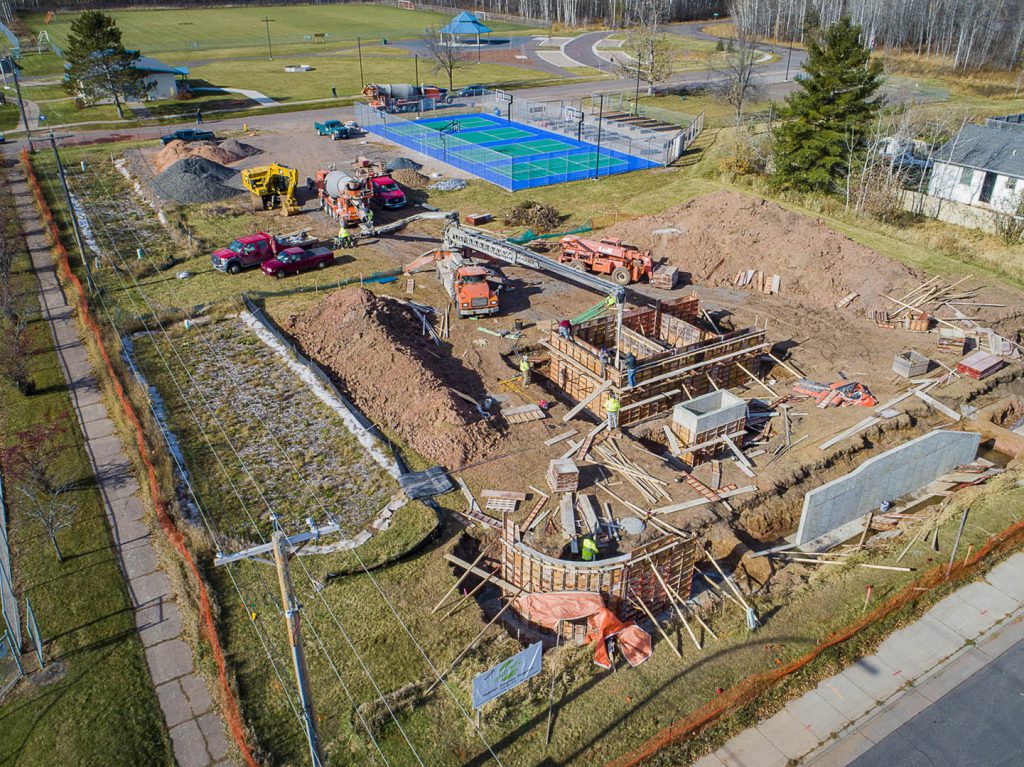 An aerial view of construction at the GND REC with the Sport Court in the background
