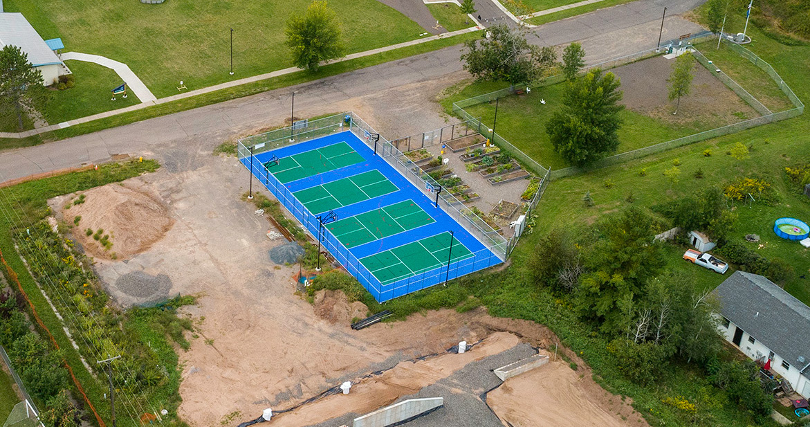 Overview of sport court, dog park and community garden at the GND REC