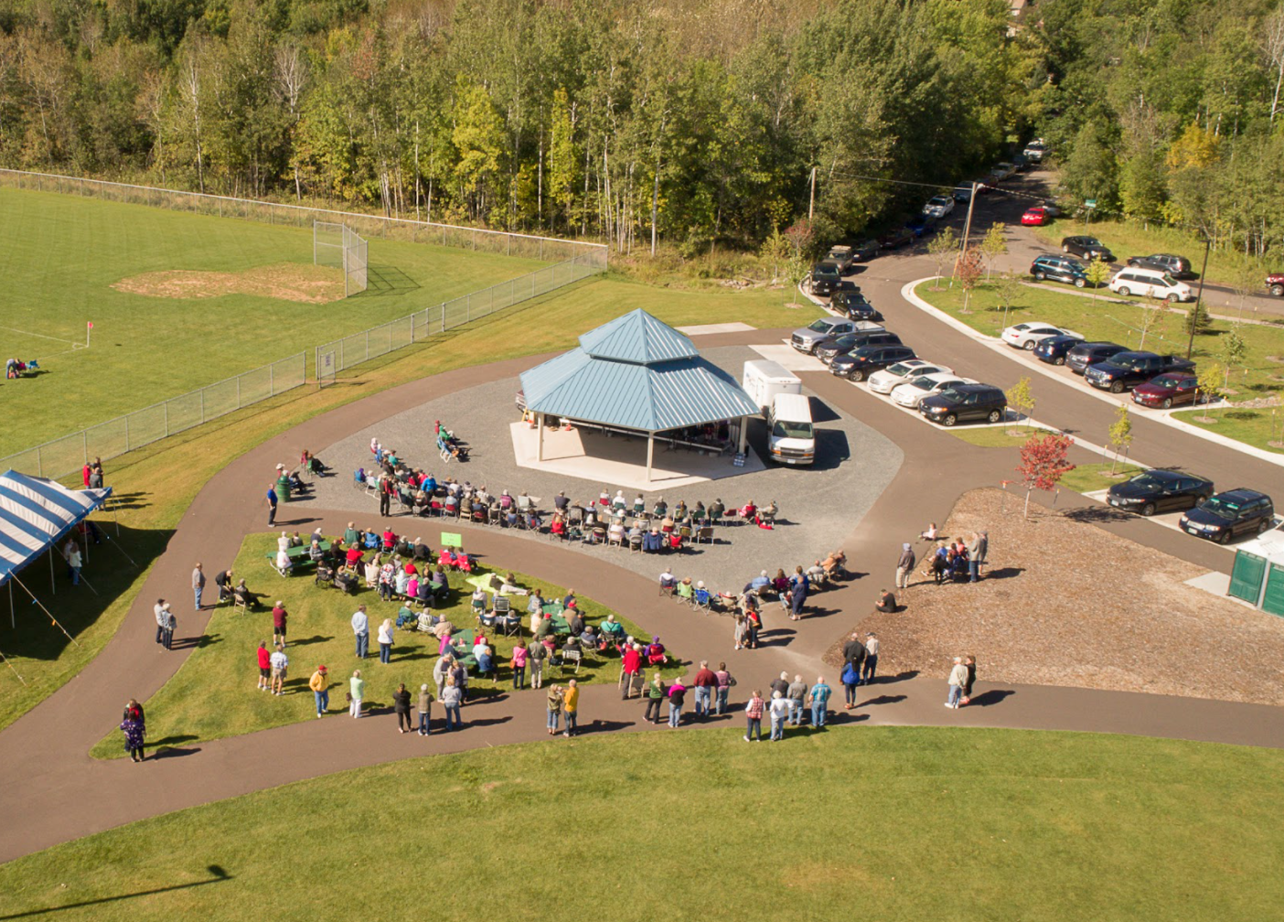 An aerial view of a group of people watching a concert at the Pavilion at GND REC