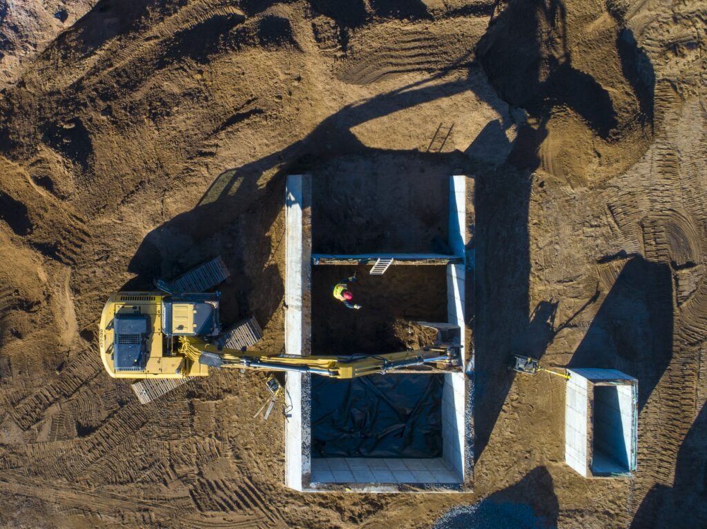 An aerial view of an excavator doing construction